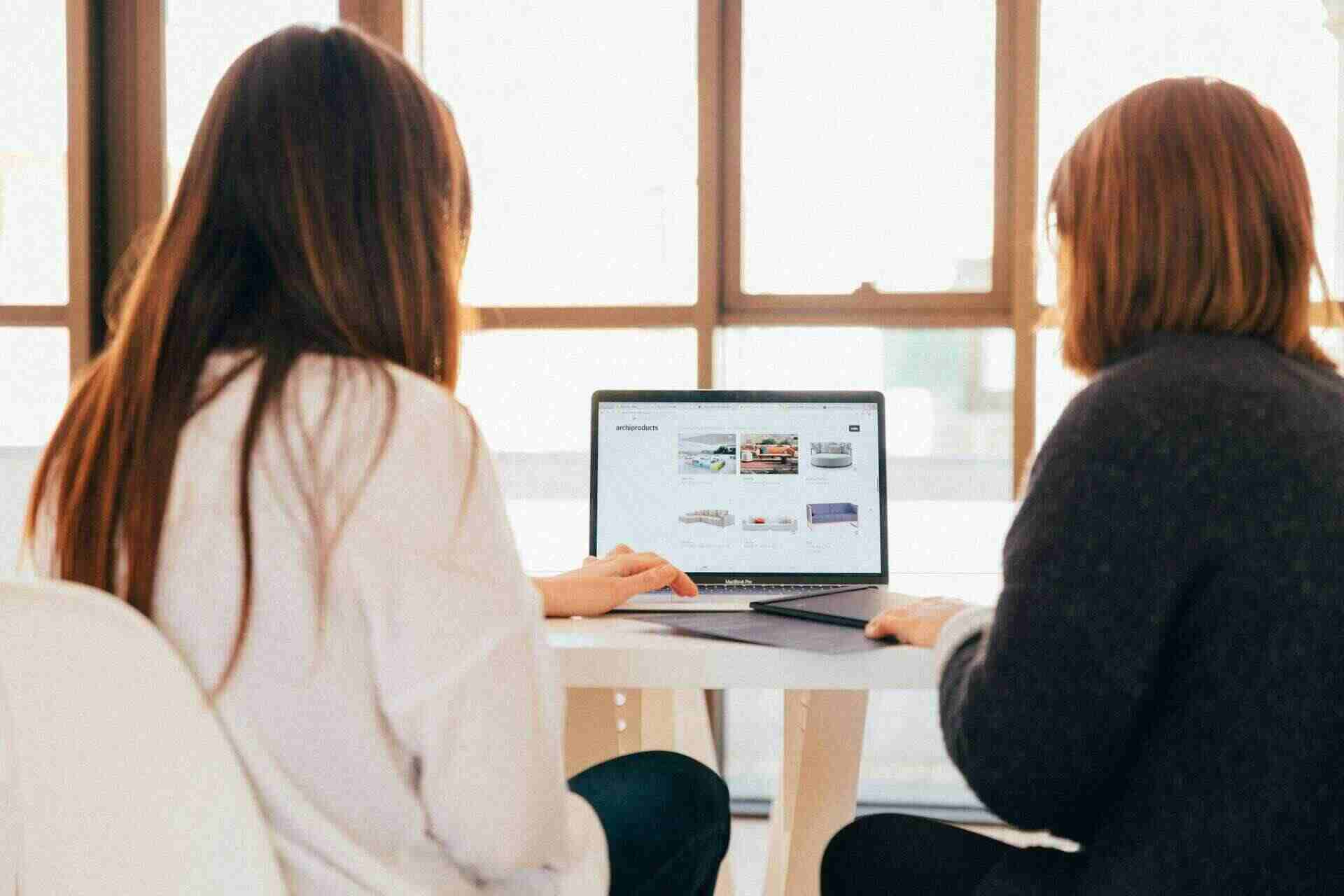 two women discussing